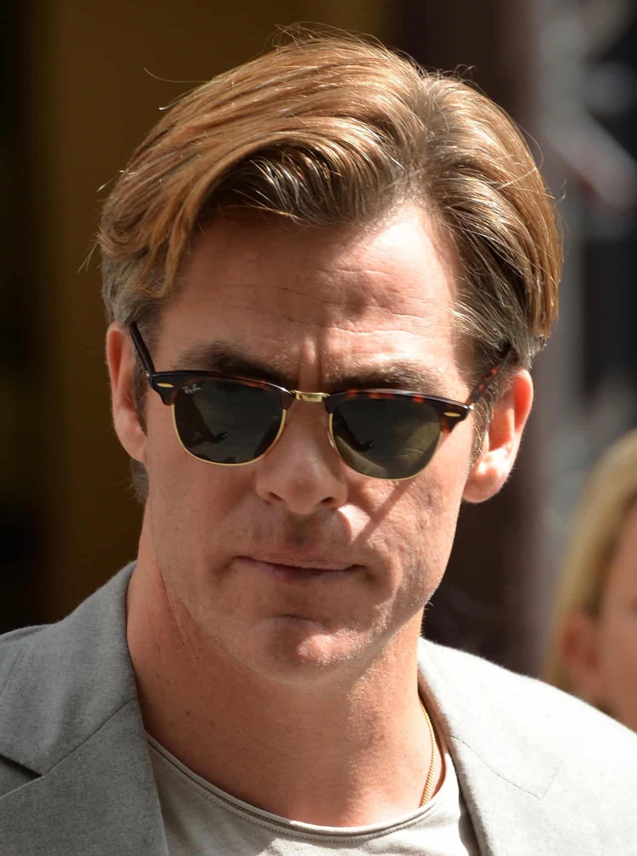 Chris Pine wearing a ray-ban clubmaster sunglasses