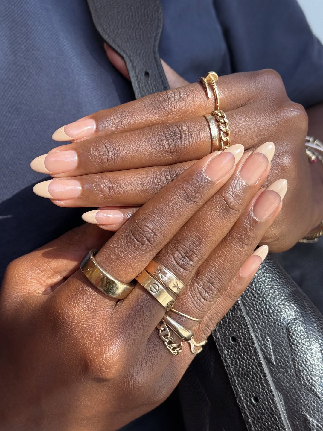 A french manicure with beige tips by Queenie Nguyen